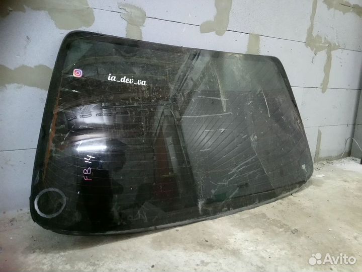 Стекло заднее Nissan Sunny (B14) viii рестайлинг