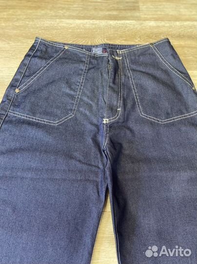 Джинсы клеш от бедра 44-46