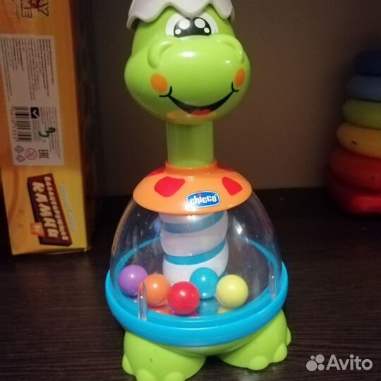 Игрушка юла chicco динозаврик