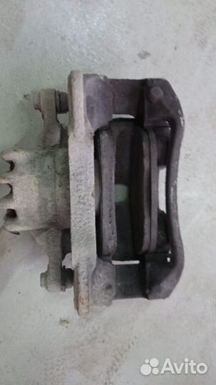 Супорт тормозной передний Peugeot 308