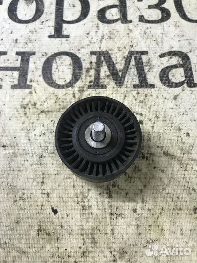 Ролик руч.ремня с кронштейном Land Rover Freelande