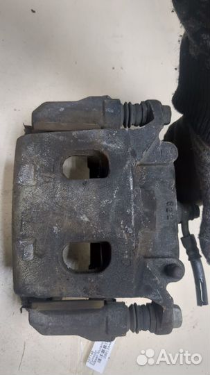 Суппорт левый передний Nissan Murano 2014