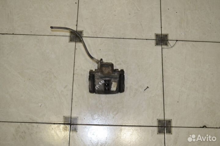 Тормозной суппорт передний правый Renault Logan