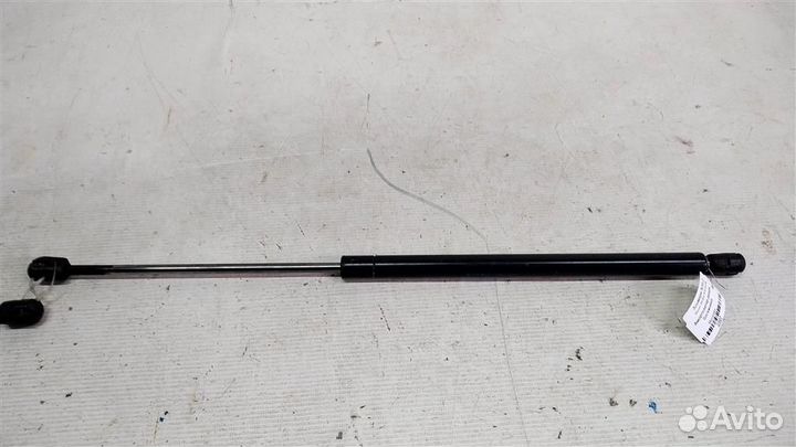 Амортизатор двери багажника Nissan Almera N16 00