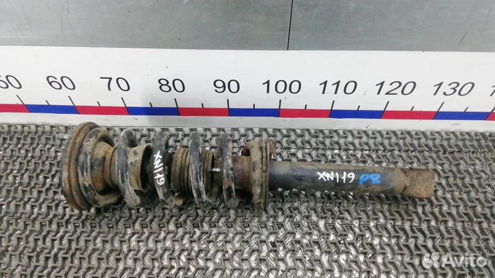 Стойка амортизатора переднего правого Mitsubishi M