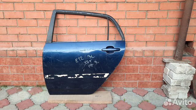 Toyota Corolla E120 хетч дверь левая задняя