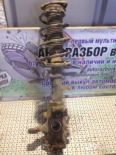 Стойка амортизатора переднего левого Ford Focus