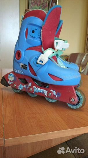 Роликовые коньки В отличном состоянии