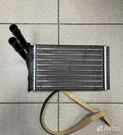 Новый Радиатор отопителя Audi 80/90/A4 86- все мод