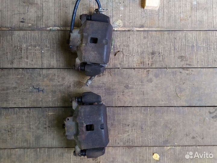 Передние Суппорта Mitsubishi lanser 9