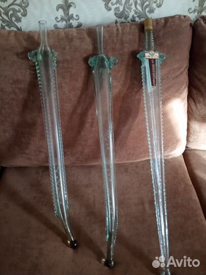 Бутылки в форме меча и сабли от коньяка