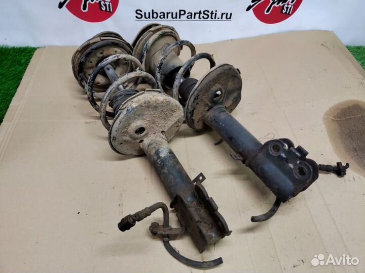 Стойки передние Toyota Corolla AE 100 5AFE 1992