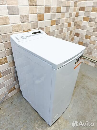 Стиральная машина с вертикальной загрузкой