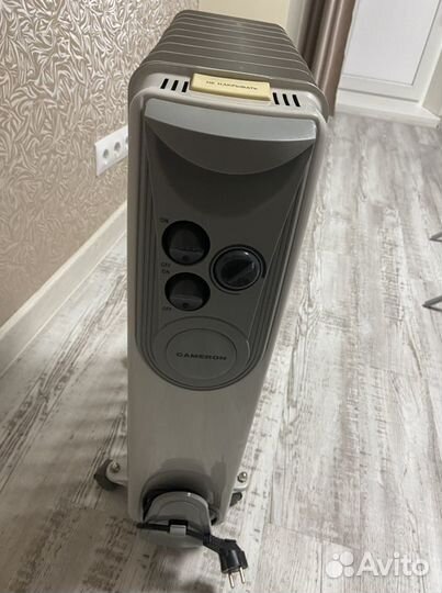 Масляный обогреватель