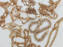 Деформированные золотые цепи и браслеты в ассортим