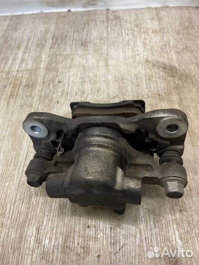 Суппорт задний левый Mitsubishi Lancer 10 CY3A