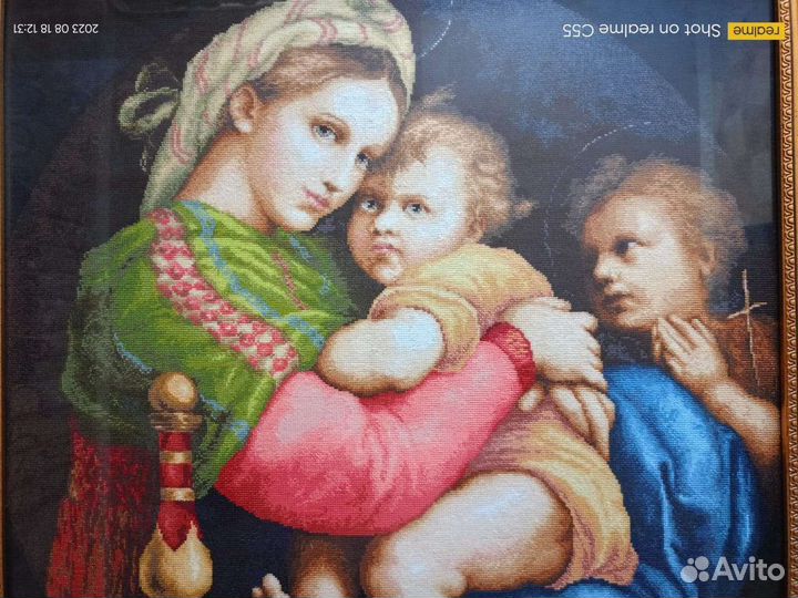 Мадонна с младенцем Рафаэля Санти