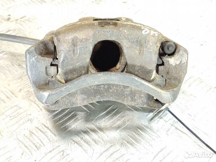 Суппорт передний правый Mitsubishi Lancer 9