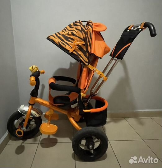 Детский трехколесный велосипед с ручкой