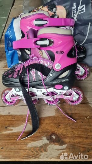 Роликовые коньки