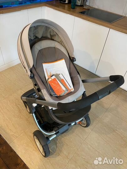 Коляска стокке stokke