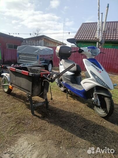 Скутер с прицепом