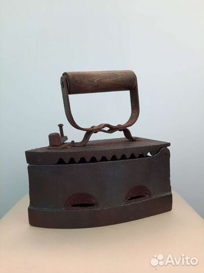 Угольный утюг