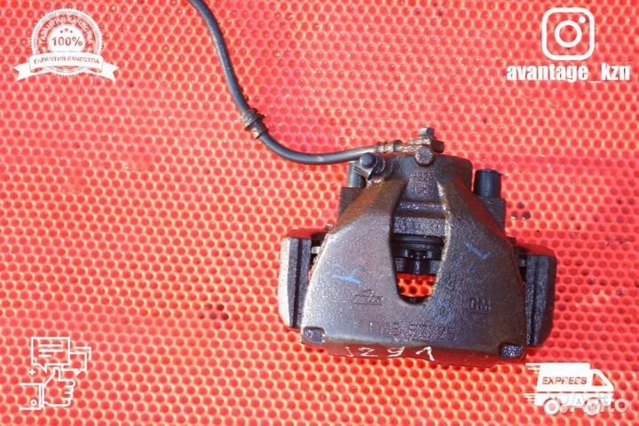 Суппорт тормозной передний правый Opel Astra H