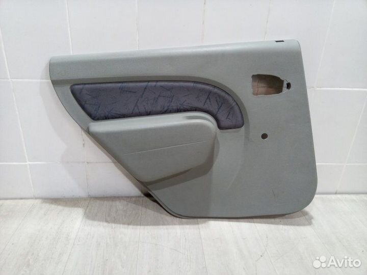 Обшивка двери задняя левая Renault Logan 2005-2014