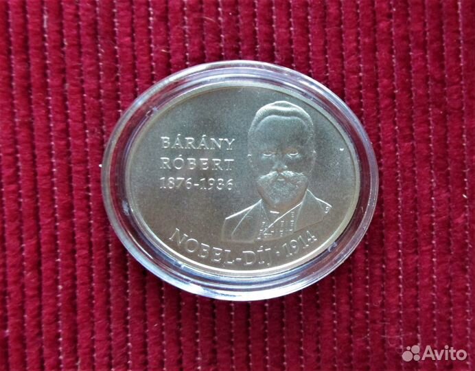 Монеты овальные