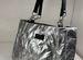 Модная женская сумка серебряная дутая