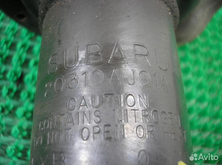 Стойка амортизатора передняя левая Subaru Legacy