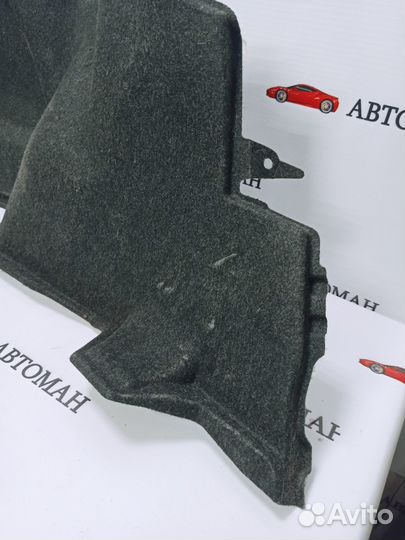 Обшивка багажника левая Toyota Corolla E150