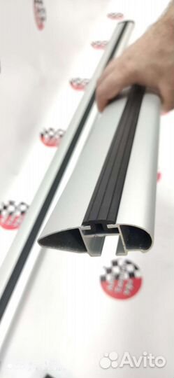 Багажник аэродинамический крыловидный на рейлинги