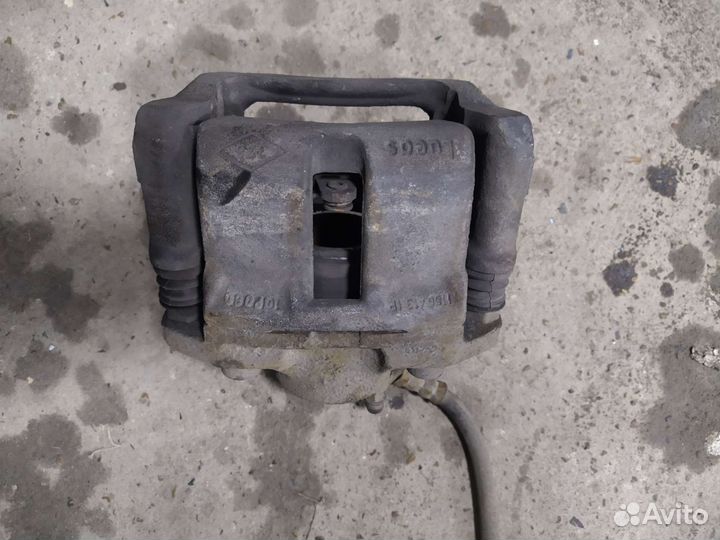 Суппорт тормозной правый renault sandero 1