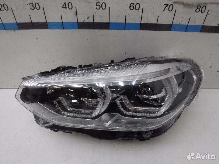 Фара левая BMW X3