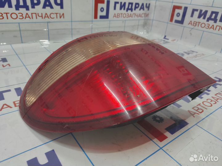 Фонарь задний левый Nissan Almera N16. Дефект. 265