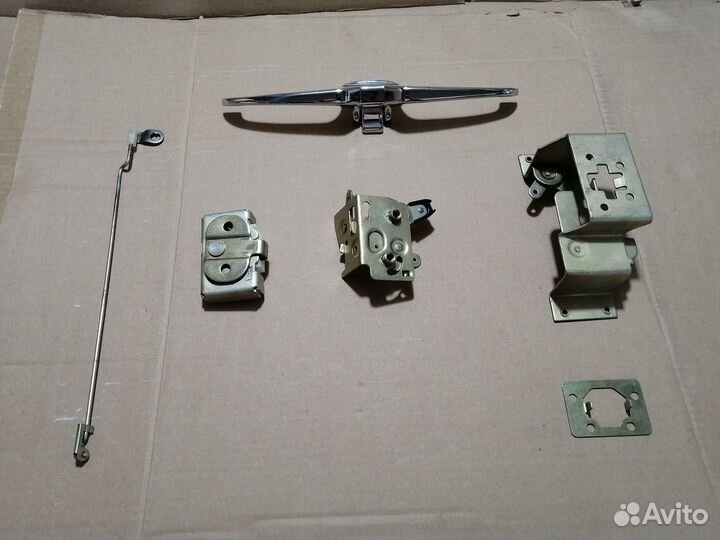Новый замок багажника в сборе Волга универсал