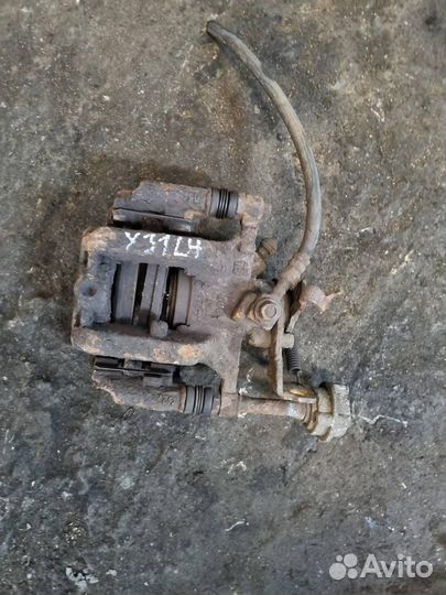 Суппорт задний левый Opel Astra J GTC