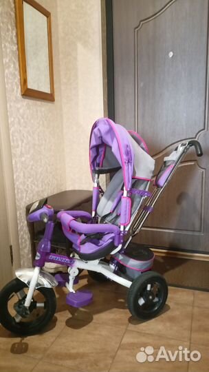 Велосипед -коляска с ручкой