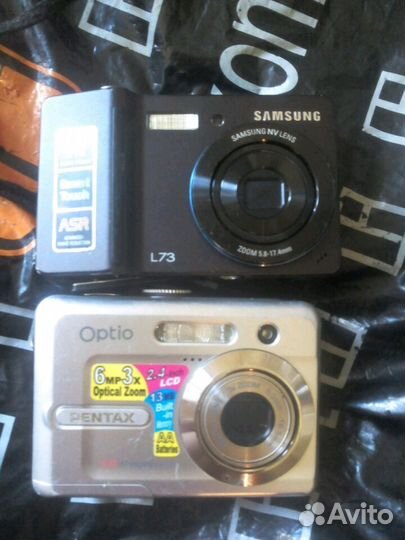 Фотоаппараты Pentax Optio e 20 и samsung l 73