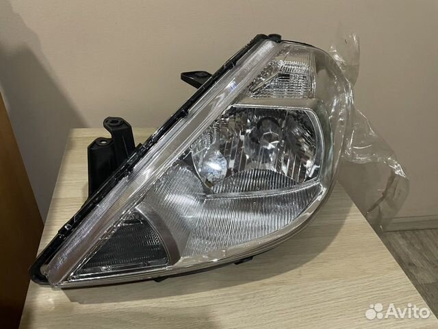 Фара левая nissan tiida 04-10