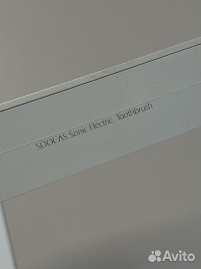 Электрическая зубная щетка