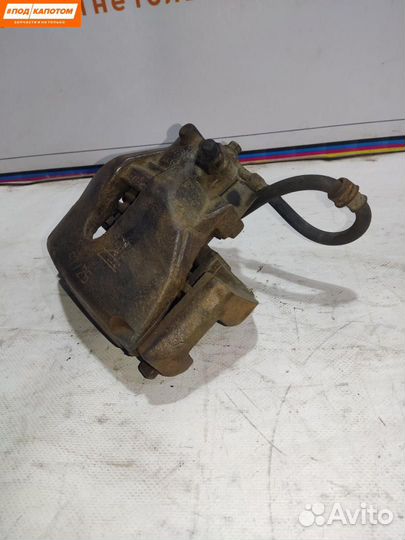 Суппорт тормозной передний левый Opel Astra