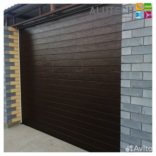 Секционные ворота для гаража alutech