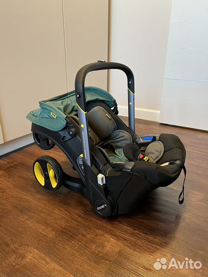 Коляска автокресло doona с базой isofix