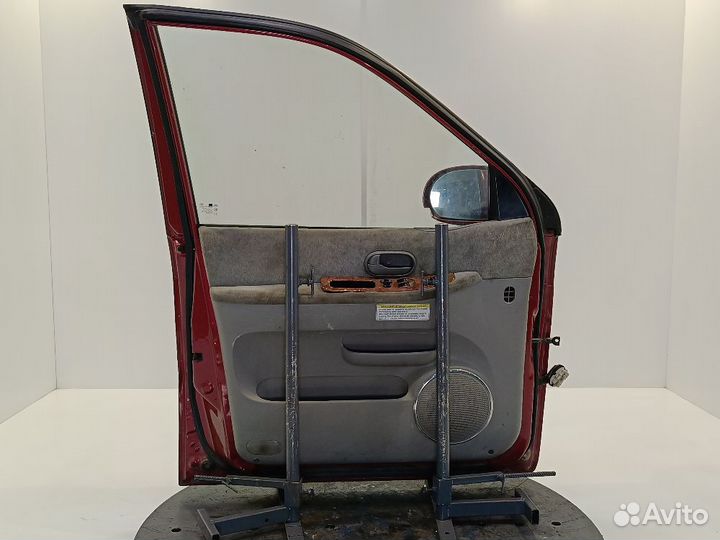 Дверь передняя левая Kia Carnival 1 Рестайлинг (02-06)