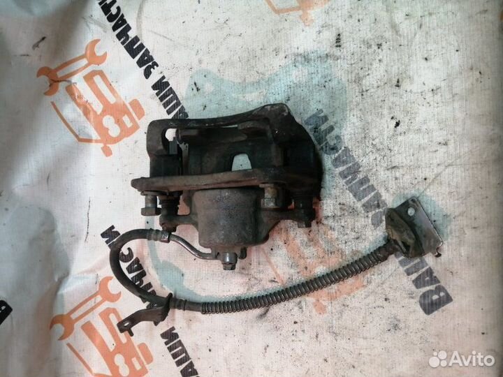 Суппорт тормозной передний правый Kia Rio 3