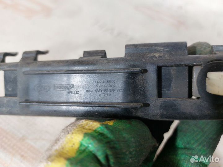 Кронштейн заднего бампера левый Kia Sorento 2 XM