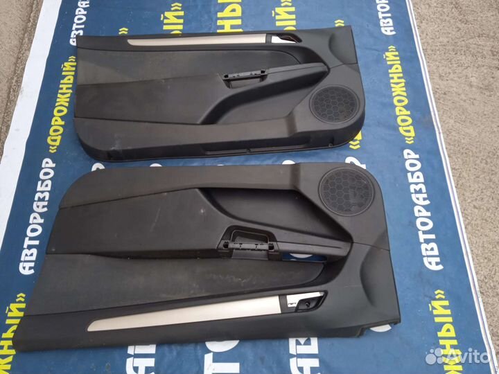 Обшивка передней двери Opel Astra GTC